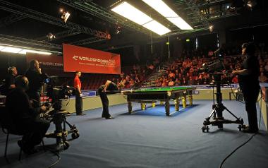 A man playing snooker at the World Snooker event at the Guild Hall.